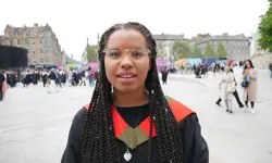 A headshot of Olivia Sweeney at the University of Edinburgh during graduation.