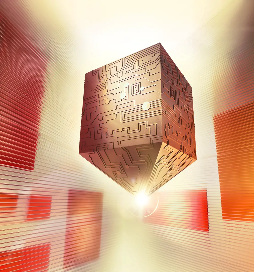 A gold cube with a pointed bottom that has circuit boards on the outside, against an orange and white background