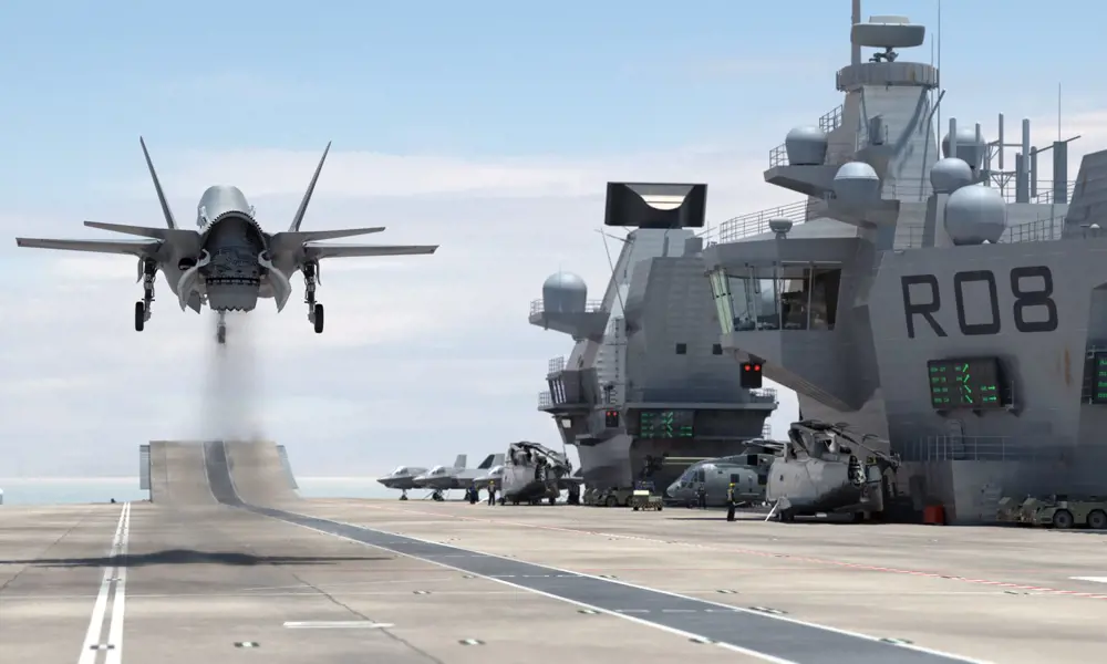 A 50 F-35B fighter jet taking off from a ship's deck.