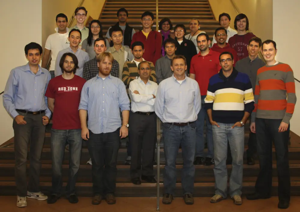 McKeown standing with his computer science group at Stanford University in 2010.