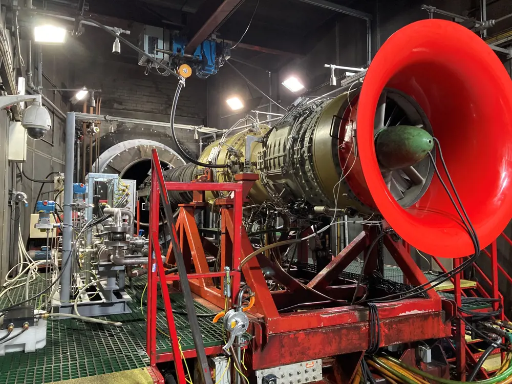 A gas turbine engine in a testing rig.