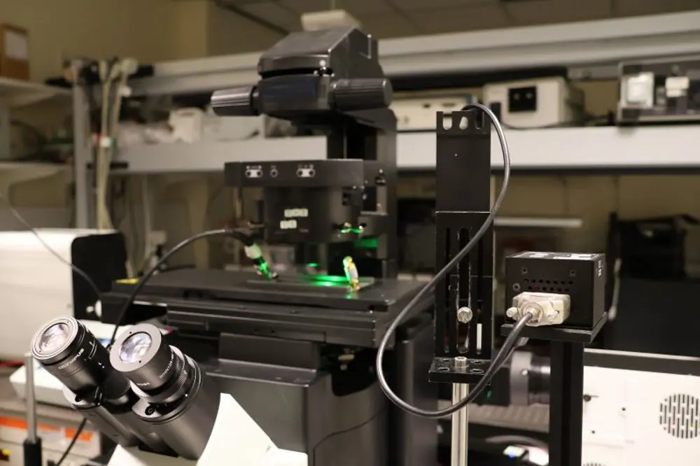 An optical microscope in a lab.