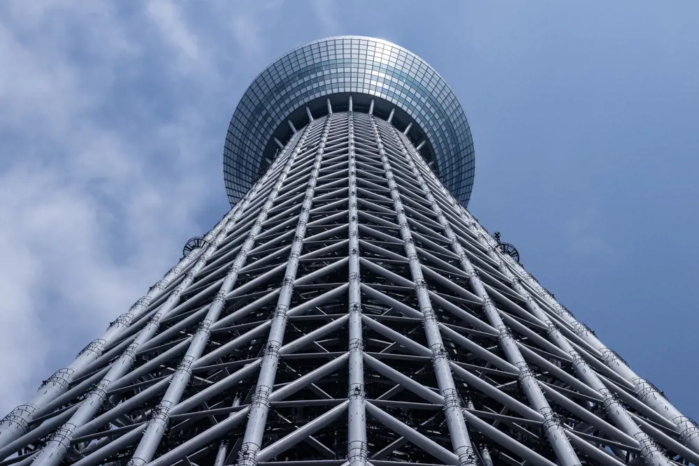 View looking up at the Tokyo Skytree, the world's tallest broadcast tower, a structure that is made of steel