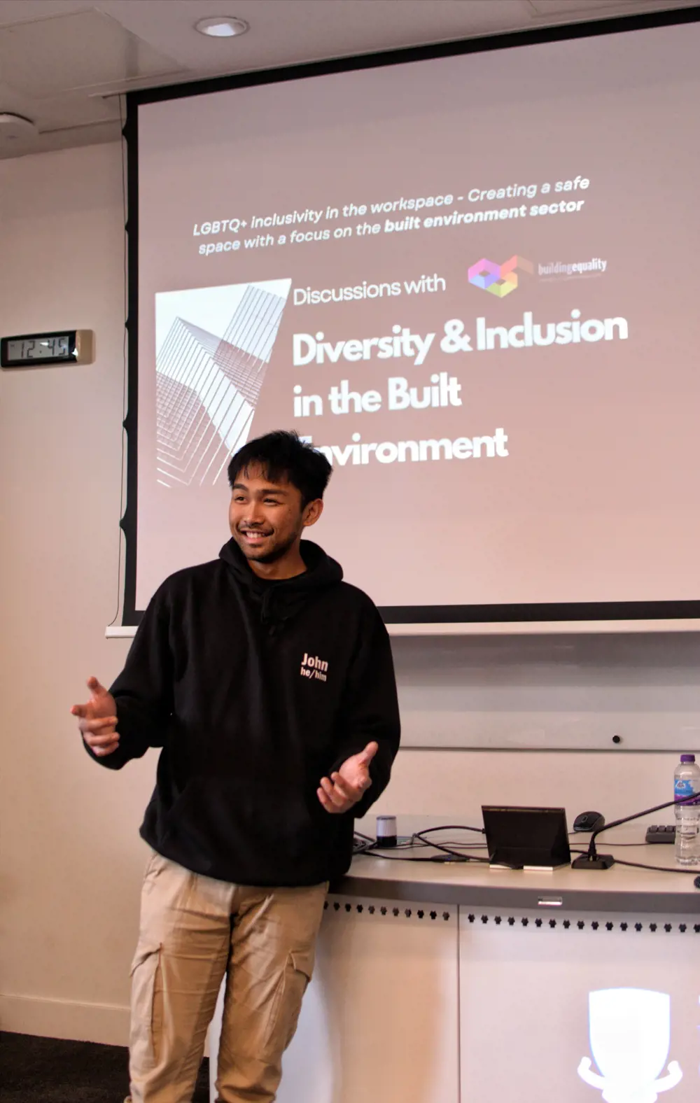 An engineering student giving a talk titled "Diversity & Inclusion in the Built Environment"
