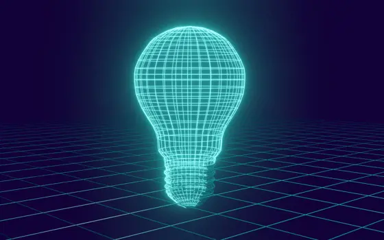 A graphic description of a glowing lightbulb against a dark blue background with turquoise gridlines
