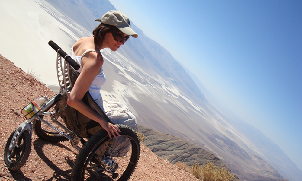 A lady sitting in a Trekinetic wheelchair at Death Valley National Park in California.